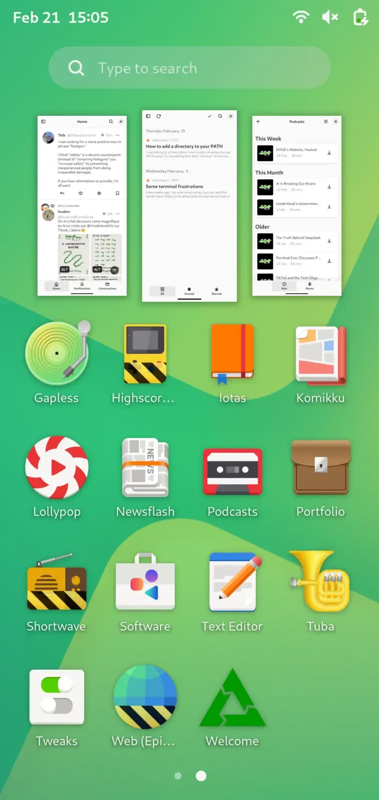 A screenshot of GNOME on a mobile phone. It has three apps open on the top third, and an app grid taken the bottom two thirds.