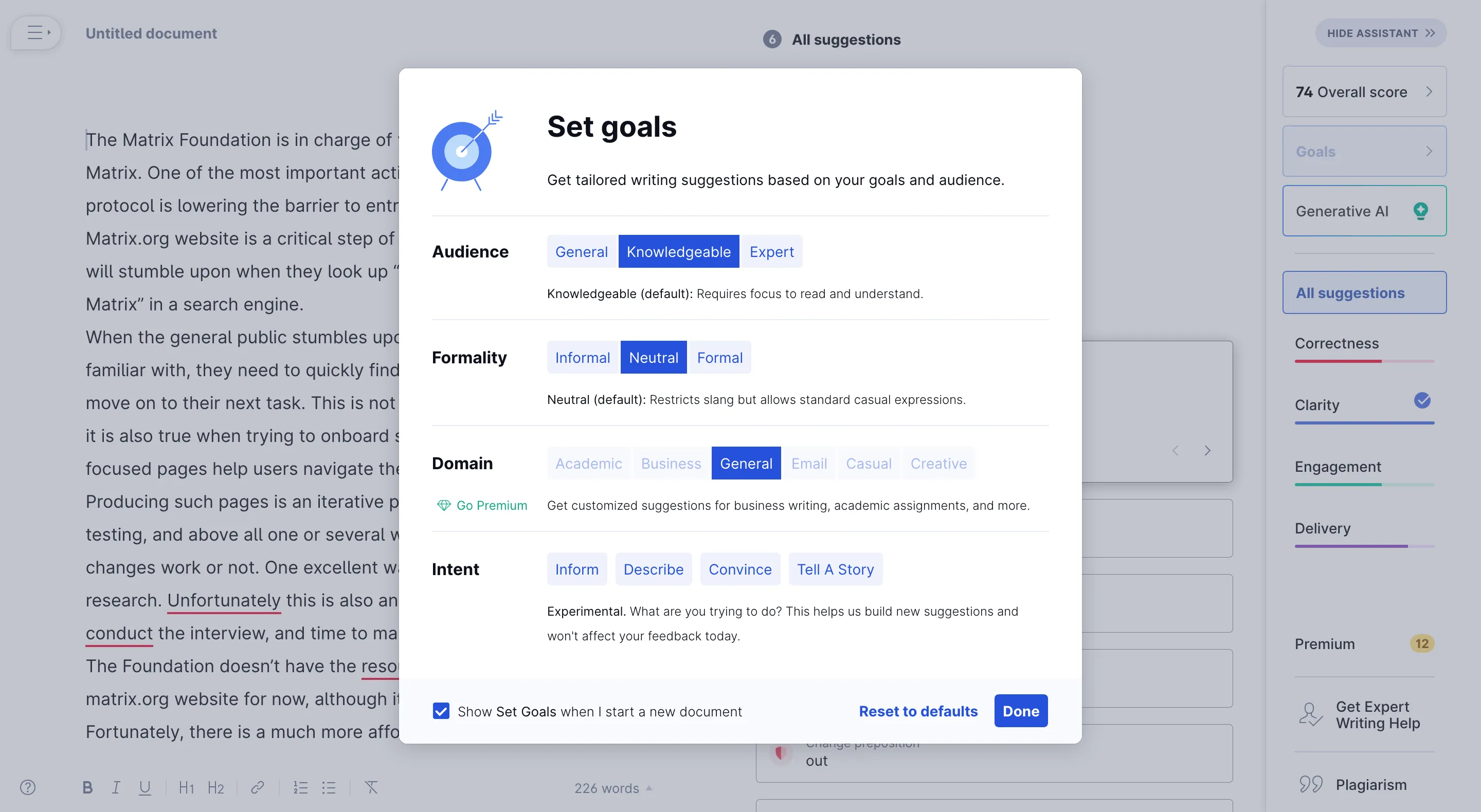 A screenshot with the same UI as described in the previous screenshot. The UI is greyed out a little, and a pop-up is in the middle of the screen. It asks the user to define goals. There are four goal categories. The first category is "Audience" and offers three options: "General", "Knowledgeable", and "Expert." The second category is "Formality" and offers three options: "Informal", "Neutral", and "Formal." The third category is "Domain" and offers six options: "Academic", "Business", "General", "Email", "Casual", and "Creative". The fourth category is "Intent" and offers four options: "Inform", "Describe", "Convince", and "Tell A Story."